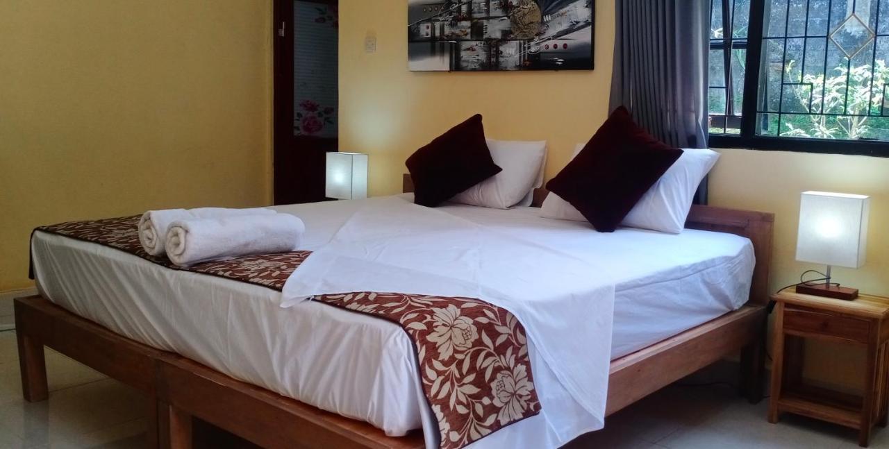 Rindu Homestay Undisan Экстерьер фото